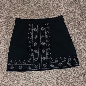 Black skirt with white embroider